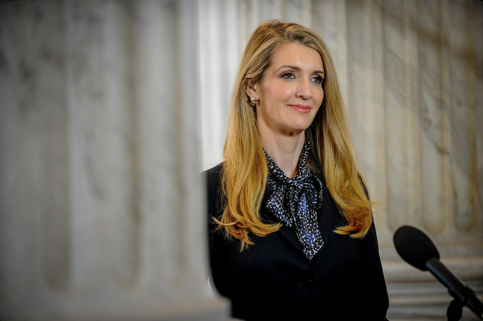 Sen. Kelly Loeffler (R-GA) who sold off millions of dollars in stock after a coronavirus briefing, waits for an interview to begin after attending a Senate Republican lunch meeting to wrap up work on coronavirus economic aid legislation to prevent the spread of coronavirus disease (COVID-19) in Washington, U.S., March 20, 2020.      REUTERS/Mary F. Calvert