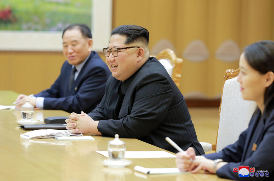 North Korean leader Kim Jong Un, center, his sister Kim Yo-jong and Kim Yong Chol, vice chairman of North Korea’s ruling Workers’ Party Central Committee, meet members of the South Korean delegation. (Photo: Korean Central News Agency/Korea News Service via AP)