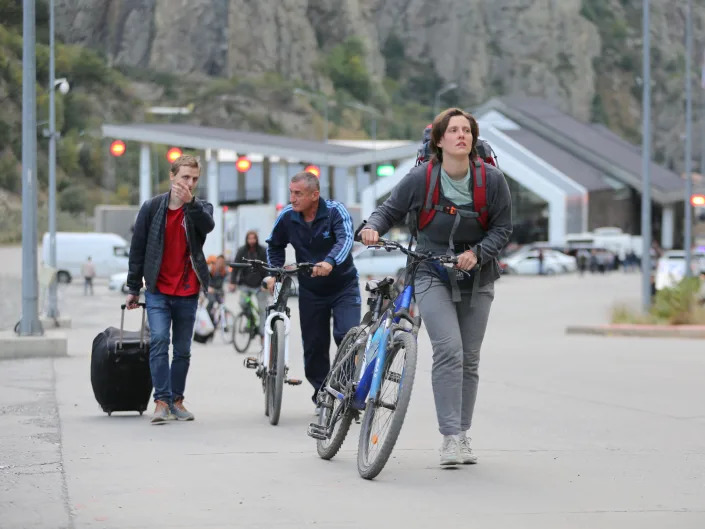 Russians are seen attempting to leave their country to avoid a military call-up for the Russia-Ukraine war as queues have formed at the Kazbegi border crossing in the Kazbegi municipality of Stepantsminda, Georgia on September 28, 2022. The number of Russian citizens entering Georgia has increased by approximately 45 percent after Vladimir Putin's partial mobilisation order.