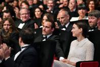 <p>Phoenix and Mara made their first public appearance as a couple at the closing ceremonies for the <a href="https://www.eonline.com/news/857734/rooney-mara-and-joaquin-phoenix-casually-make-their-awards-show-debut-at-cannes-film-festival-s-closing-night" rel="nofollow noopener" target="_blank" data-ylk="slk:Cannes Film Festival;elm:context_link;itc:0;sec:content-canvas" class="link ">Cannes Film Festival</a> on May 28, 2017. The pair sat together and interacted like a couple, including holding hands and embracing after Phoenix won the festival's best actor award for his role in 2017's <em>You Were Never Really Here</em>.</p> <p>"They were talking to one another nonstop," a <a href="https://people.com/movies/joaquin-phoenix-looked-up-fiancee-rooney-mara-internet/" rel="nofollow noopener" target="_blank" data-ylk="slk:source told PEOPLE;elm:context_link;itc:0;sec:content-canvas" class="link ">source told PEOPLE</a> at the time. "Small talk between them. Then they went for their car, and he's holding her hand like it was unconscious. Like it fits. They seem a totally natural and easy couple."</p>