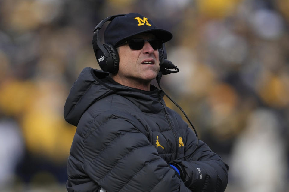 Michigan head coach Jim Harbaugh watches against Illinois in the first half of an NCAA college football game in Ann Arbor, Mich., Saturday, Nov. 19, 2022. (AP Photo/Paul Sancya)