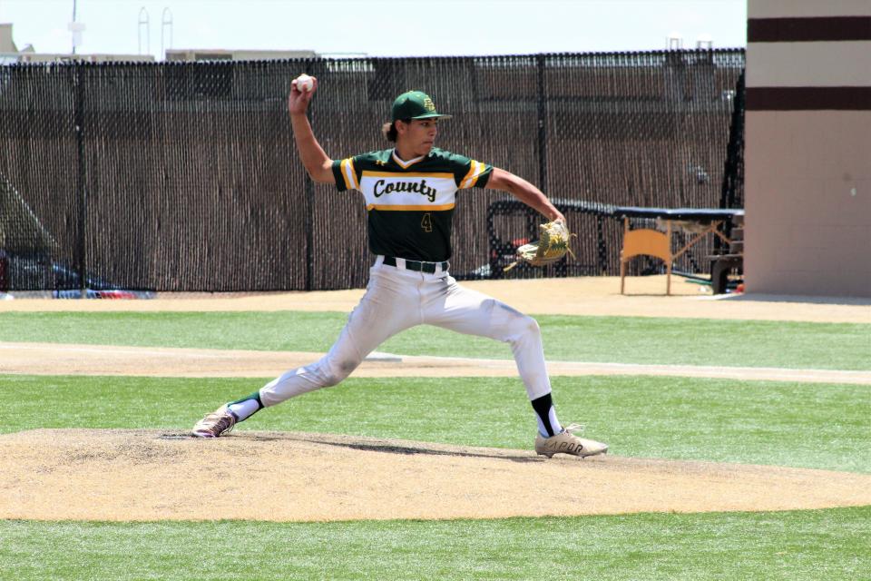 Pueblo County's pitcher Johnathan Gonzales gets set to toss his pitch against Lutheran in the CHSAA Class 4A state baseball tournament held at Cheyenne Mountain High School on May 27, 2023.