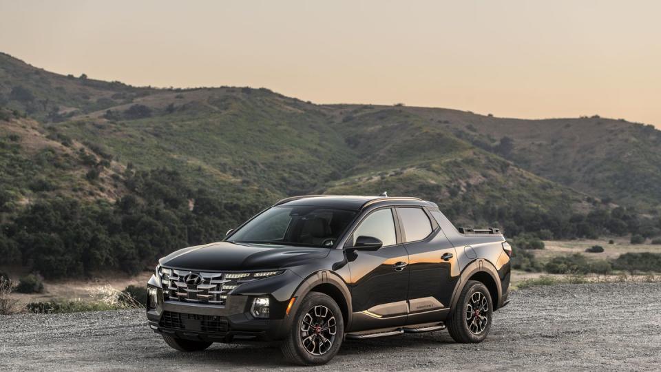 black 2024hyundai santa cruz in the mountains