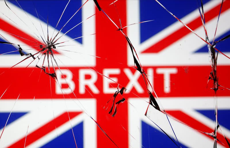 British flag is seen through broken glass in this illustration picture