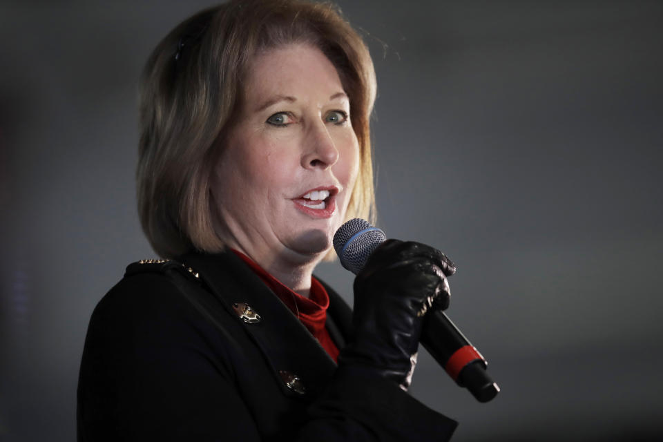 FILE - Attorney Sidney Powell, an attorney for Donald Trump, speaks during in Alpharetta, Ga., Dec. 2, 2020. A Georgia judge has ruled that former President Donald Trump and 16 others will be tried separately from two defendants who are set to go to trial next month in the case accusing them all of participating in an illegal scheme to overturn the results of the 2020 election. Lawyers Sidney Powell and Kenneth Chesebro had filed demands for a speedy trial, and Fulton County Superior Court Judge Scott McAfee set their trial to begin Oct. 23. (AP Photo/Ben Margot, File)