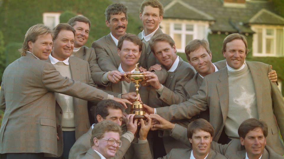 Watson (center holding trophy) celebrates with his US team after triumph at The Belfry in 1993. - Chris Cole/Getty Images
