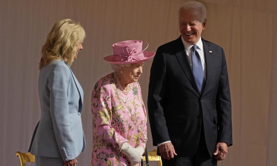 Joe Biden, the Queen and Jill Biden watch a Guard of Honour march on Sunday