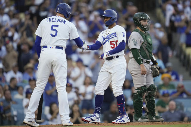 L.A. Dodgers' Freddie Freeman High Fives Dad After First Home Run