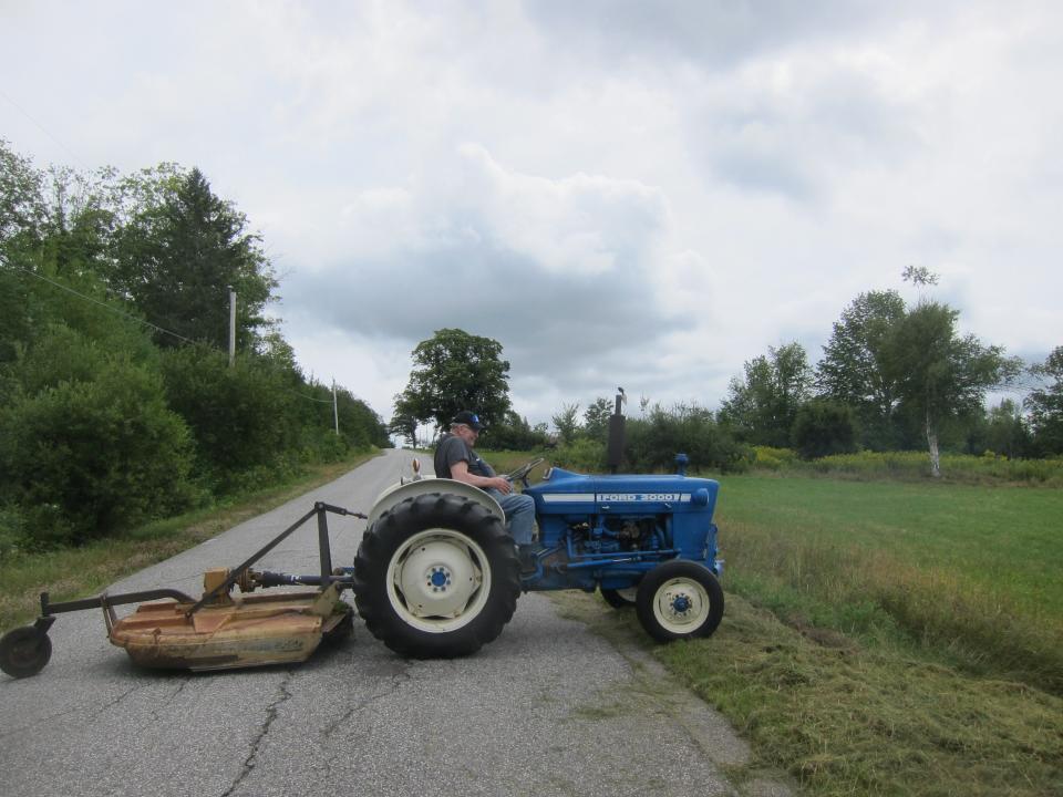 Farmers have the right of way on the rural backroads of Maine, even if you're in the middle of a long climb.