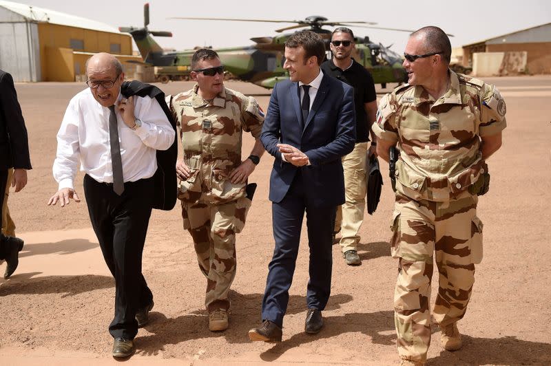 FILE PHOTO: French President Emmanuel Macron visits French troops in Africa's Sahel region in Mali