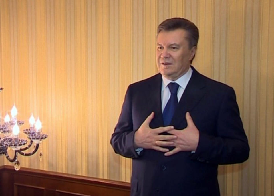 In this image made from video released by the Regional Administration of Kharkiv and distributed by AP Video, Viktor Yanukovych, President of Ukraine, speaks in Kharkiv, Ukraine, Saturday, Feb. 22, 2014. Protesters took control of Ukraine's capital Saturday, seizing the president's office as parliament voted to remove him and hold new elections. Yanukovych described the events as a coup and insisted he would not step down. After a tumultuous week that left scores dead and Ukraine's political destiny in flux, fears mounted that the country could split in two — a Europe-leaning west and a Russian-leaning east and south. (AP Photo / Regional Administration of Kharkiv)