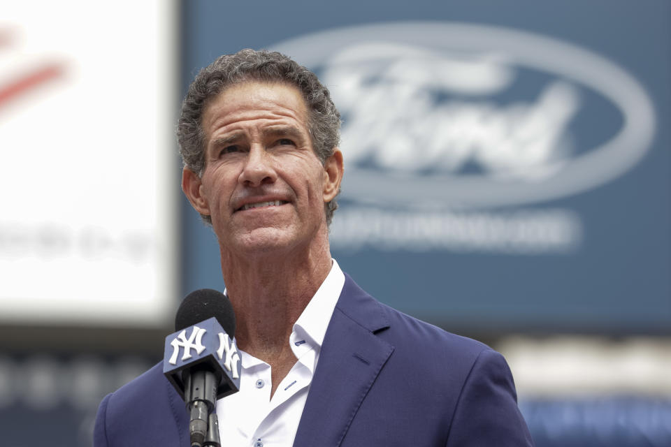 Retired New York Yankees player Paul O'Neill speaks to fans during a number retirement ceremony before a baseball game between the Yankees and the Toronto Blue Jays, Sunday, Aug. 21, 2022, in New York. (AP Photo/Corey Sipkin)