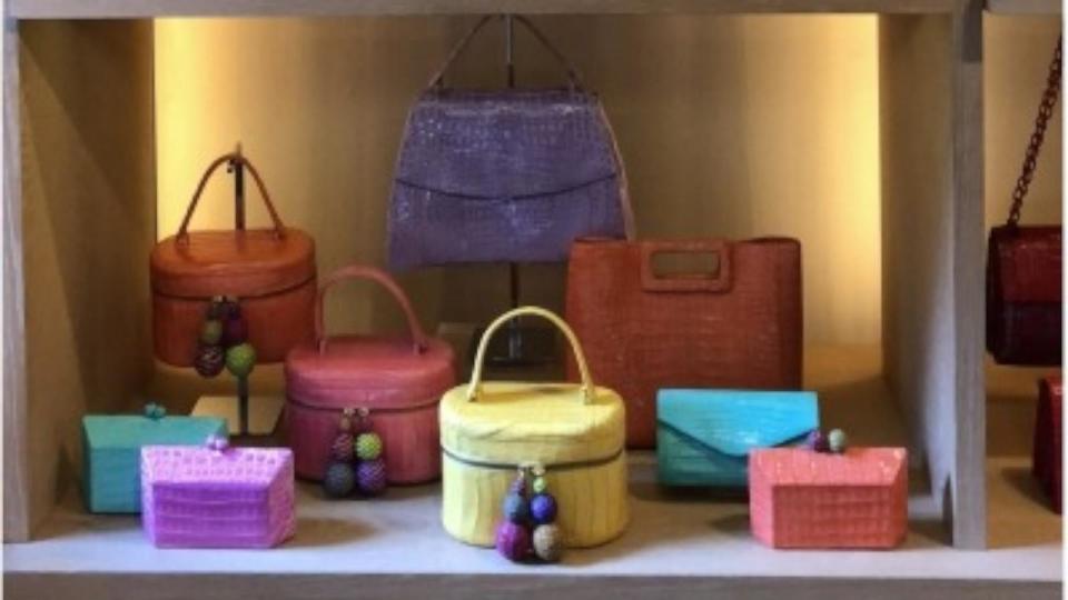 PHOTO: Photo is of handbags designed by Nancy Gonzalez and displayed in the Gzuniga Ltd. showroom. Photo is from Exhibit 3 to the government’s reply to objections to presentence report and sentencing memorandum in United States v. Gzuniga Ltd. (United States Department of Justice)