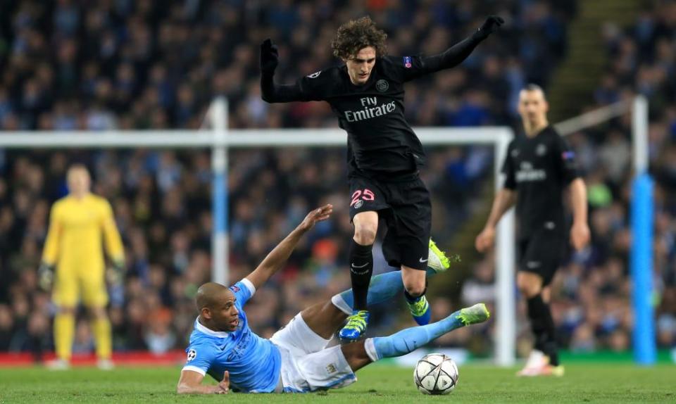 Paris Saint-Germain’s Adrien Rabiot hurdles the tackle from Manchester City’s Fernandinho during the UEFA Champions League Quarter Final, Second Leg match at the Etihad Stadium, Manchester.