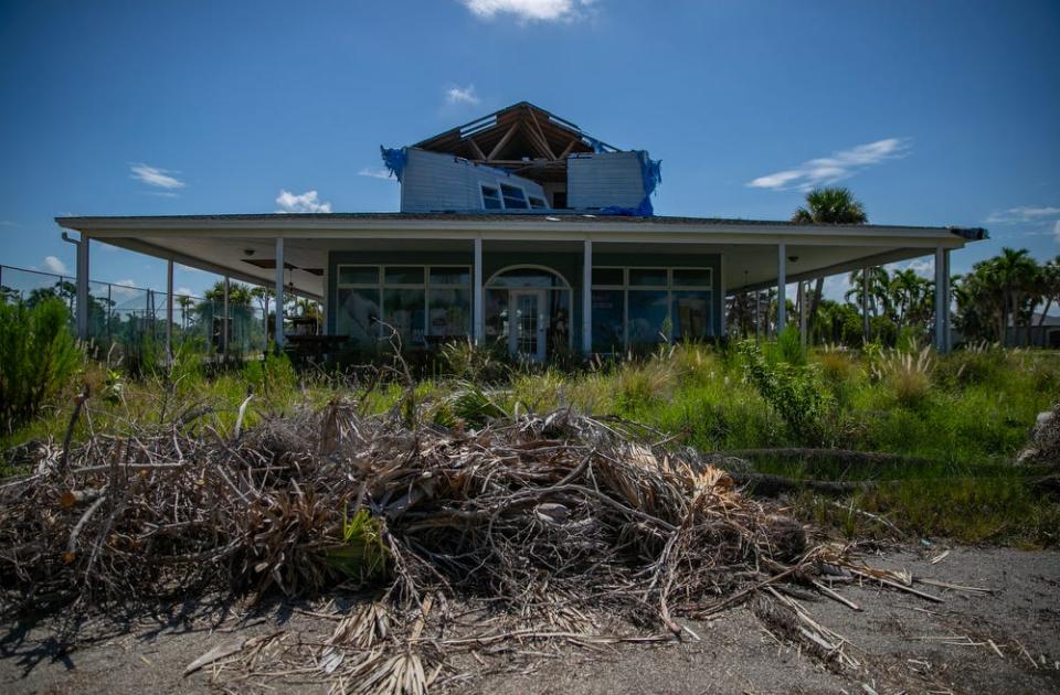 View of the clubhouse at Alden Pines Golf Course in Bokeelia which has remained closed after suffering extensive damage from Hurricane Ian. Lee County resident Scott Snyder organized a group of property owners from the Pineland neighborhood to band together in order to keep its golf course from being sold for development along Pine Island's historic mangrove fringe, once the native Calusa's capital.