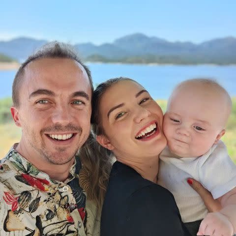 <p>Frankie Muniz Instagram</p> Frankie Muniz with his wife, Paige Muniz, and their son, Mauz Mosley Muniz, taking a selfie outdoors