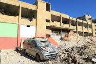 Damaged ambulance and hospital are pictured at a site hit by overnight airstrike, in Kafr Takharim, northwest of Idlib city, Syria April 25, 2017. REUTERS/Ammar Abdullah