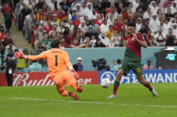 Portugal's Goncalo Ramos, right, scores his side's fifth goal during the World Cup round of 16 soccer match between Portugal and Switzerland, at the Lusail Stadium in Lusail, Qatar, Tuesday, Dec. 6, 2022. (AP Photo/Alessandra Tarantino)