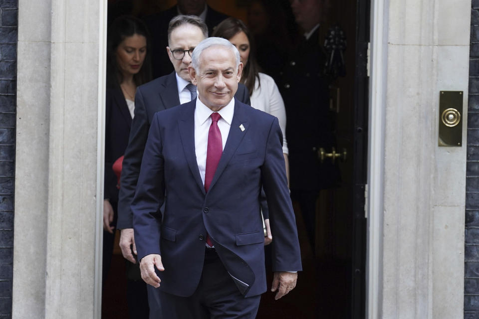 Israeli Prime Minister Benjamin Netanyahu leaves 10 Downing Street after meeting with Britain's Prime Minister Rishi Sunak, in London, Friday, March 24, 2023. (Stefan Rousseau/PA via AP)