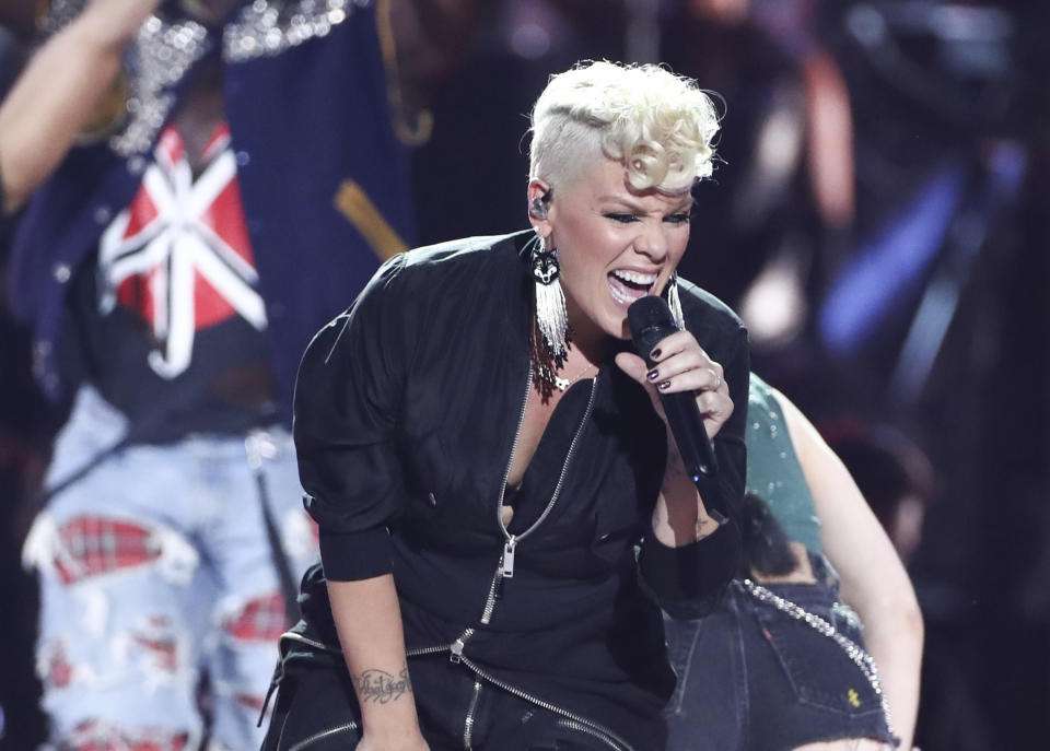FILE - In this Sept. 22, 2017, file photo, Pink performs at the 2017 iHeartRadio Music Festival Day 1 held at T-Mobile Arena in Las Vegas. The Recording Academy’s Task Force on Diversity and Inclusion is a launching a new initiative announced Friday, Feb. 1, 2019, to create and expand more opportunities to female music producers and engineers. More than 200 musicians, labels and others have already pledged, including Pink, Lady Gaga, Justin Bieber, Pearl Jam, Pharrell and Ariana Grande. (Photo by John Salangsang/Invision/AP, File)
