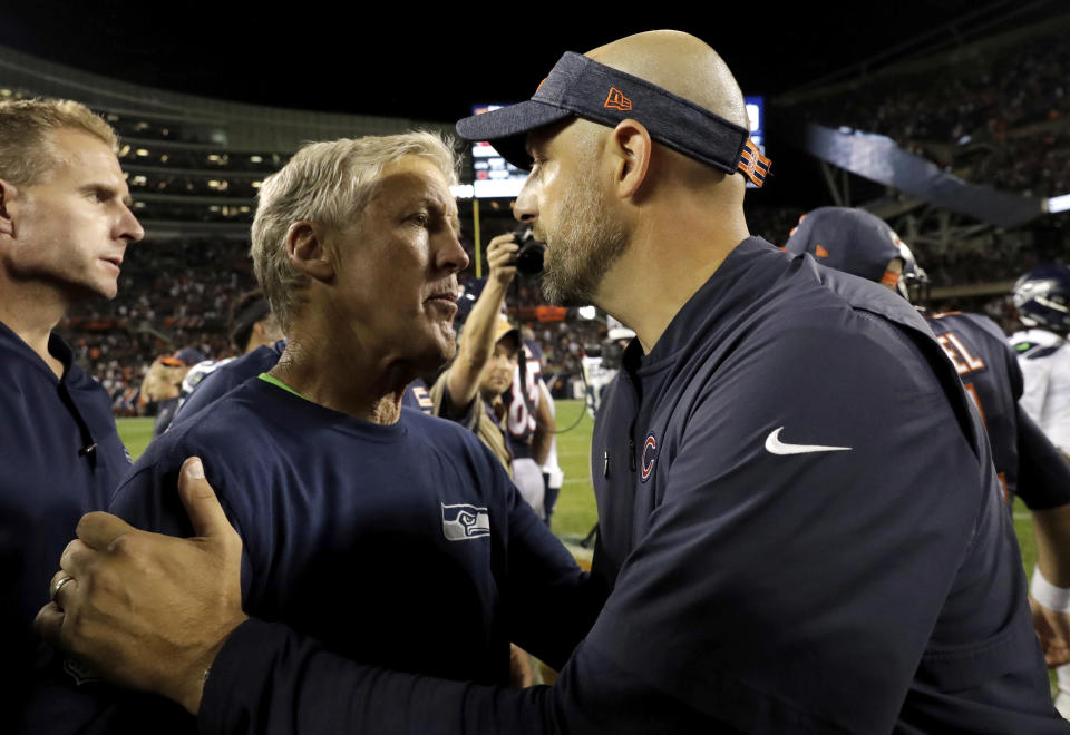 Seattle Seahawks head coach Pete Carroll, left, and Chicago Bears head coach Matt Nagy greet each other after an NFL football game Monday, Sept. 17, 2018, in Chicago. The Bears won 24-17. (AP Photo/Nam Y. Huh)