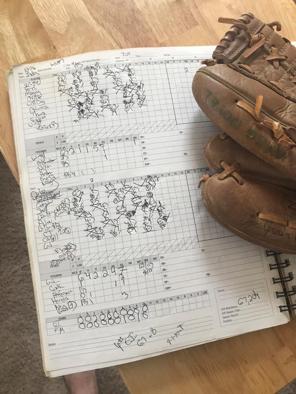 One of Gregg Doyel's first gloves – it says “Greg Doyel” in green along thumb – and his scorebook from Marlins’ 1997 season. Note that it ends one at-bat early; Edgar Renteria’s single with two outs in 11th inning of World Series Game 7 wasn't included because it ended the game and Doyel had to file a story to The Miami Herald immediately.