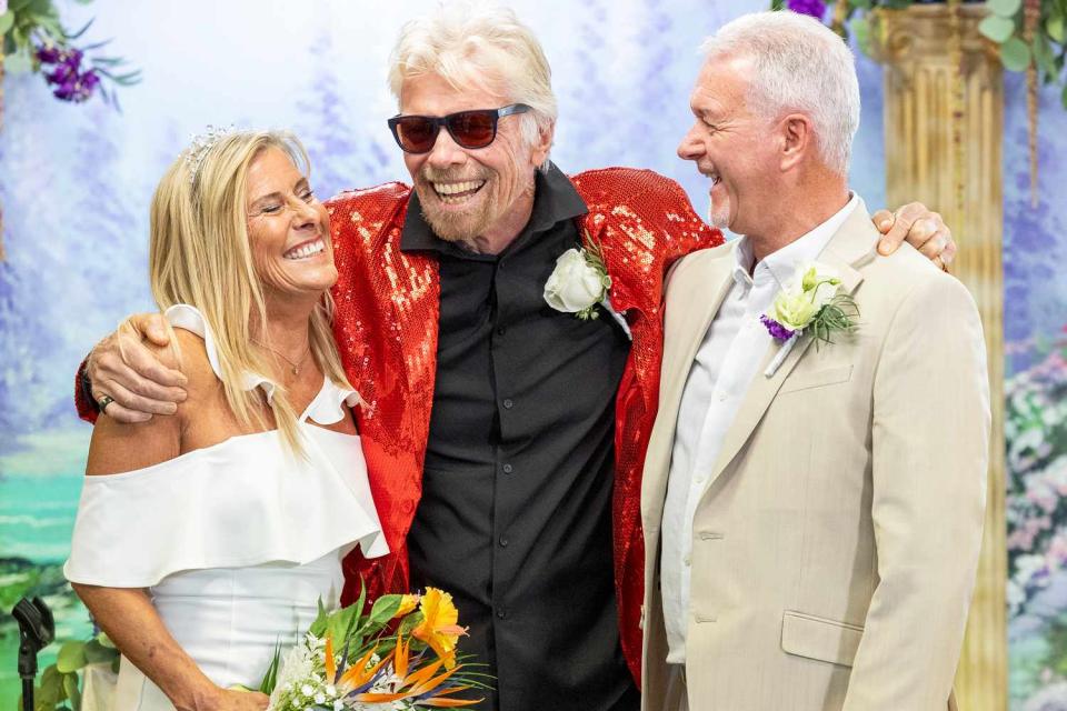 <p>Virgin Atlantic Airways</p> Richard Branson with Virgin Atlantic crew members Malcolm and Jacqui in Las Vegas