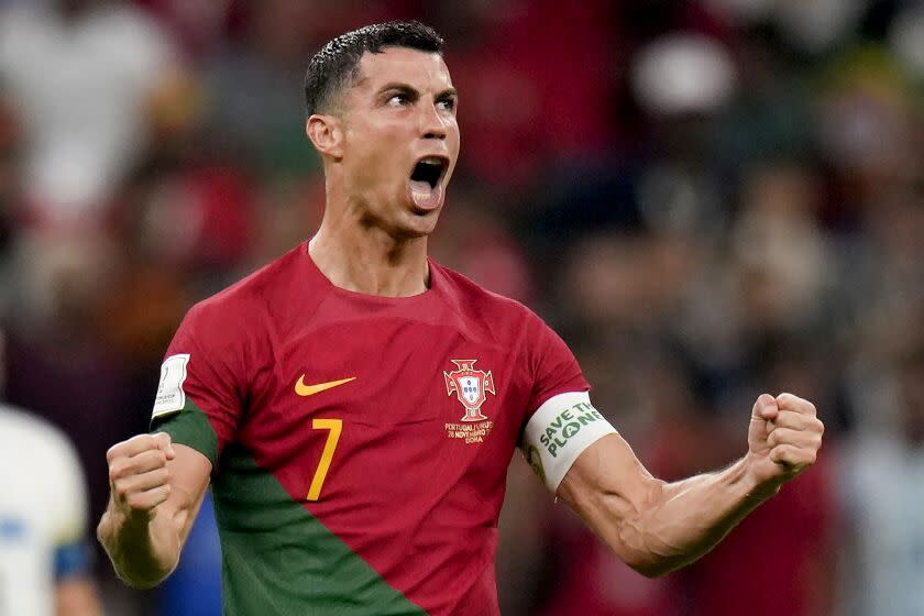 FILE - Portugal's Cristiano Ronaldo celebrates his side's opening goal during the World Cup group H soccer match between Portugal and Uruguay, at the Lusail Stadium in Lusail, Qatar, Monday, Nov. 28, 2022. (AP Photo/Aijaz Rahi, File)