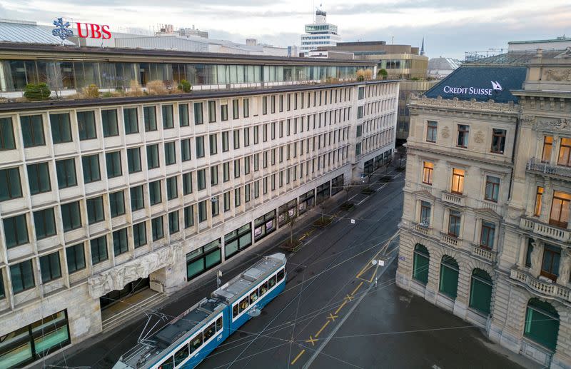 FILE PHOTO: Buildings of Swiss banks UBS and Credit Suisse are seen on the Paradeplatz in Zurich