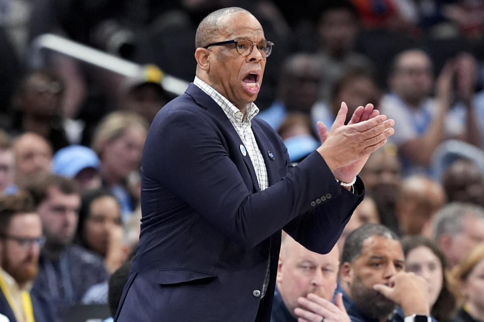 North Carolina head coach Hubert Davis encourages his team during the first half of the Atlantic Coast Conference quarterfinals NCAA college basketball tournament game against Florida State, Thursday, March 14, 2024, in Washington. (AP Photo/Susan Walsh)