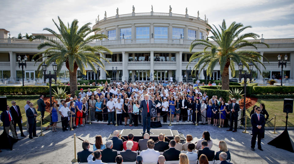 FILE - This photo from Tuesday, Oct. 25, 2016 shows then Republican presidential candidate Donald Trump speaking at a campaign event with employees at Trump National Doral in Miami. President Donald Trump was in full sales mode Monday, Aug. 26, 2019, doing everything but passing out brochures as he touted the features that would make the Doral golf resort the ideal place for the next G7 Summit _ close to the airport, plenty of hotel rooms, separate buildings for every delegation, even top facilities for the media. (AP Photo/Evan Vucci, File)