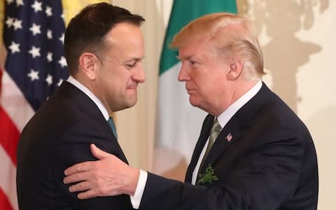 Irish Taoiseach Leo Varadkar and US President Donald Trump during the annual shamrock presentation ceremony at the White House in Washington DC - Credit: Niall Carson/PA