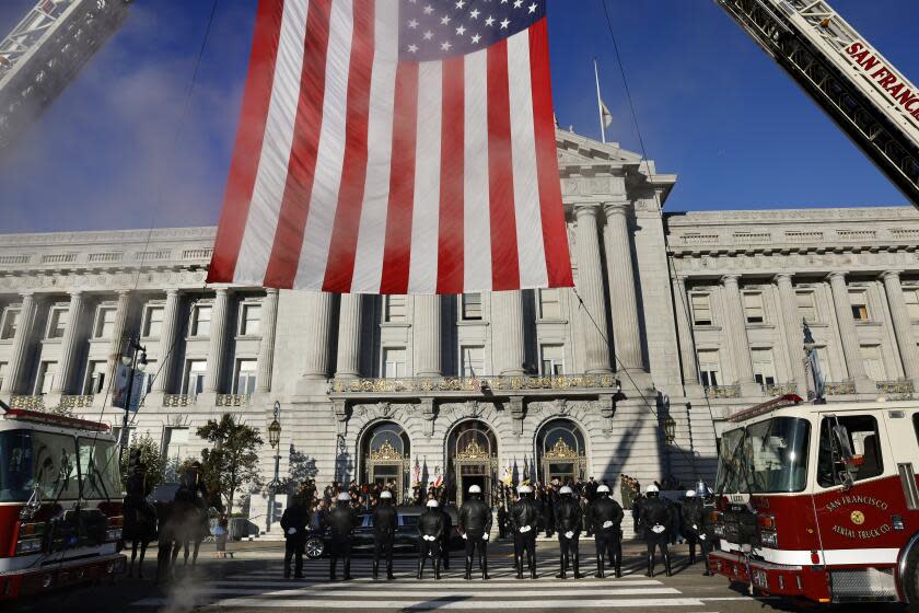 San Francisco, CA - October 04: The late Senator Dianne Feinstein(D-CA) lies in state during a ceremony to honor the senator from California at San Francisco City Hall on Wednesday, Oct. 4, 2023, in San Francisco, CA. (Gina Ferazzi / Los Angeles Times)