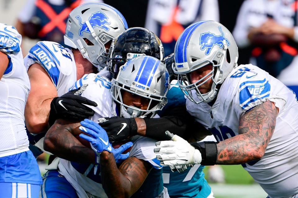 Detroit Lions running back D'Andre Swift (32) runs the ball in for a touchdown against the Jacksonville Jaguars during the second half on Sunday, Oct. 18, 2020 at TIAA Bank Field.