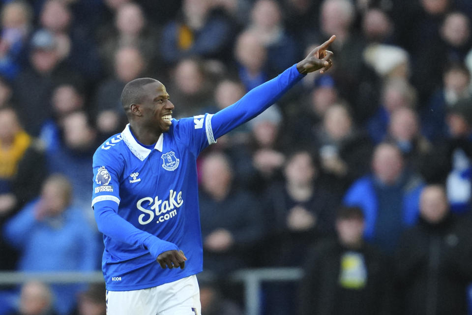 Everton's Abdoulaye Doucoure celebrates after scoring his side's opening goal during the English Premier League soccer match between Everton and Chelsea, at Goodison Park Stadium, in Liverpool, England, Sunday, Dec.10, 2023. (AP Photo/Jon Super)