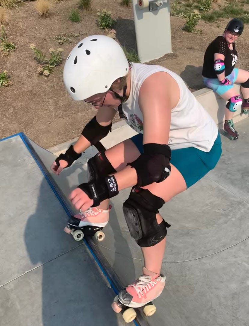 I finally learned to stall on the halfpipe at Lauridsen. Please note the toes of my skates, which I have lovingly duct-taped together after dragging them on the ground too much.