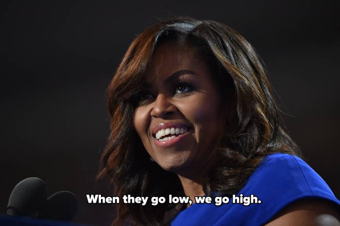 Michelle Obama Smiling with quote: "When they go low, we go high."