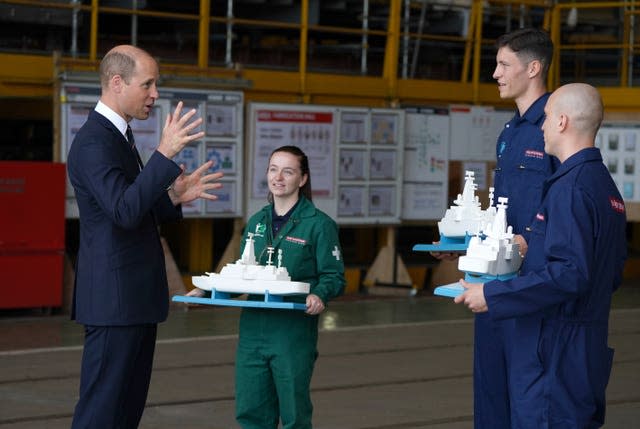 Models of warships being given to William as gifts