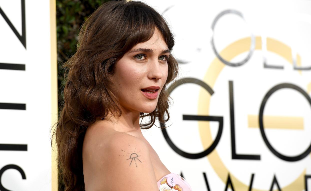 Lola Kirke rocked a pink Andrew Gn dress...and matching pink pin.&nbsp;