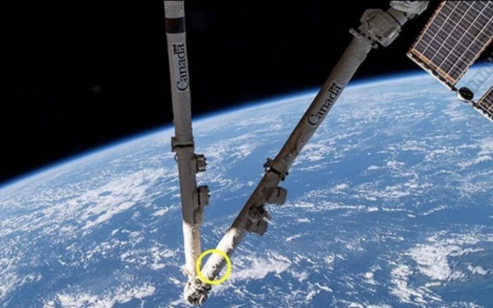 The impact has left a 5mm-wide hole in the Canadarm2 - CSA/NASA