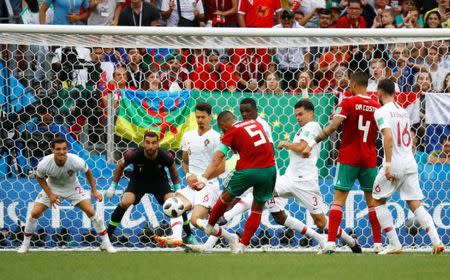 Soccer Football - World Cup - Group B - Portugal vs Morocco - Luzhniki Stadium, Moscow, Russia - June 20, 2018 Morocco's Medhi Benatia misses a chance to score REUTERS/Kai Pfaffenbach