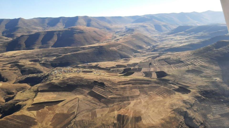 A view from the Lesotho Flying Doctor Services plane, flown by pilot Matthew Monson of the Mission Aviation Fellowship, which works with the project to bring health care to people in far-flung corners of the rugged southern African nation. / Credit: CBS News