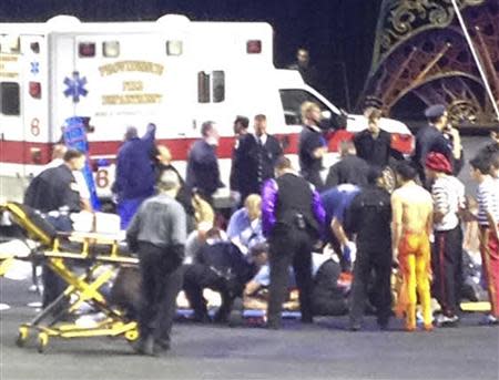 Emergency personnel attend to injured performers after a scaffolding collapsed during a Ringling Bros. and Barnum & Bailey Circus performance in Providence, Rhode Island in this picture provided by Kyle Therrien May 4, 2014. REUTERS/Handout via Kyle Therrien