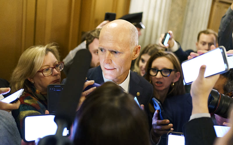 Sen. Rick Scott (R-Fla.) addresses reporters following a Senate Republican policy luncheon