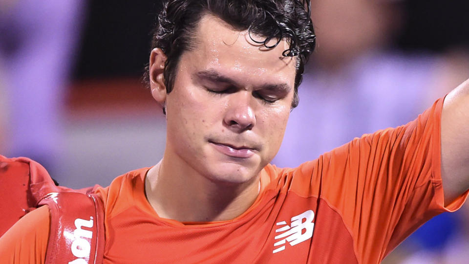 Milos Raonic appeared to be in tears as he left the court in front of his home fans.  (Photo by Minas Panagiotakis/Getty Images)