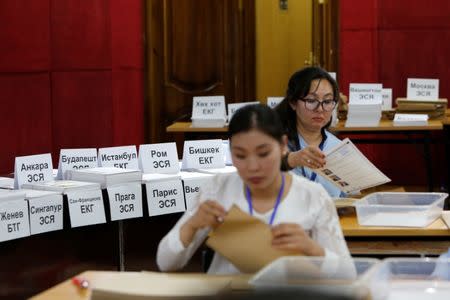 Election officials count votes in the presidential election in Ulaanbaatar, Mongolia, June 26, 2017. REUTERS/B. Rentsendorj