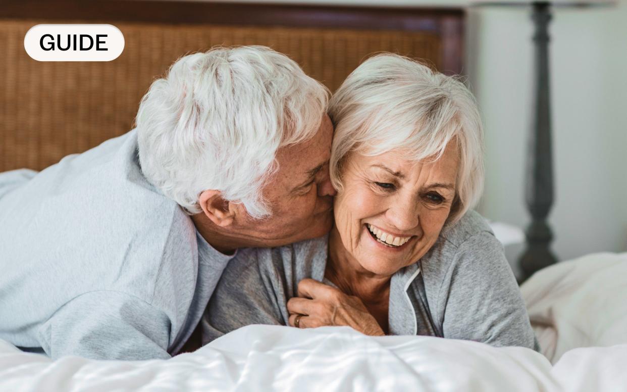 Elderly man and woman in bed