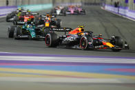 Red Bull driver Sergio Perez of Mexico steers his car during the Saudi Arabia Formula One Grand Prix at the Jeddah corniche circuit in Jeddah, Saudi Arabia, Sunday, March 19, 2023. (AP Photo/Hassan Ammar)