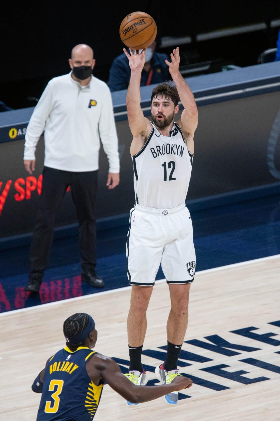 Joe Harris helps the Nets from long range.