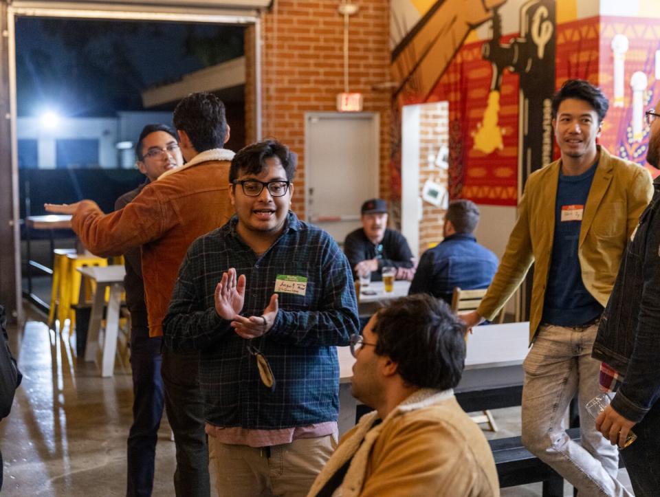 Angel Lozano meets with a screenwriters at Cerveceria Del Pueblo in Pasadena .